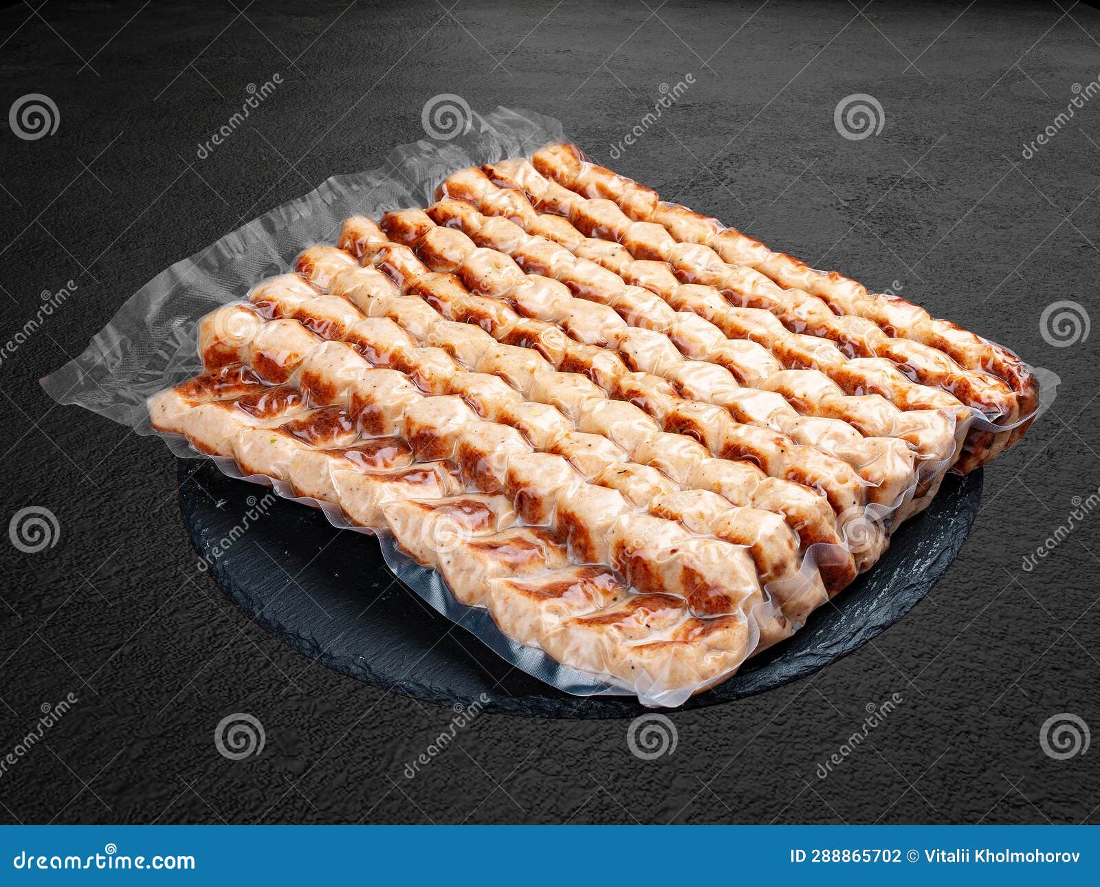 grilled chicken lulas. vacuum-packed minced meat products.  on a dark background