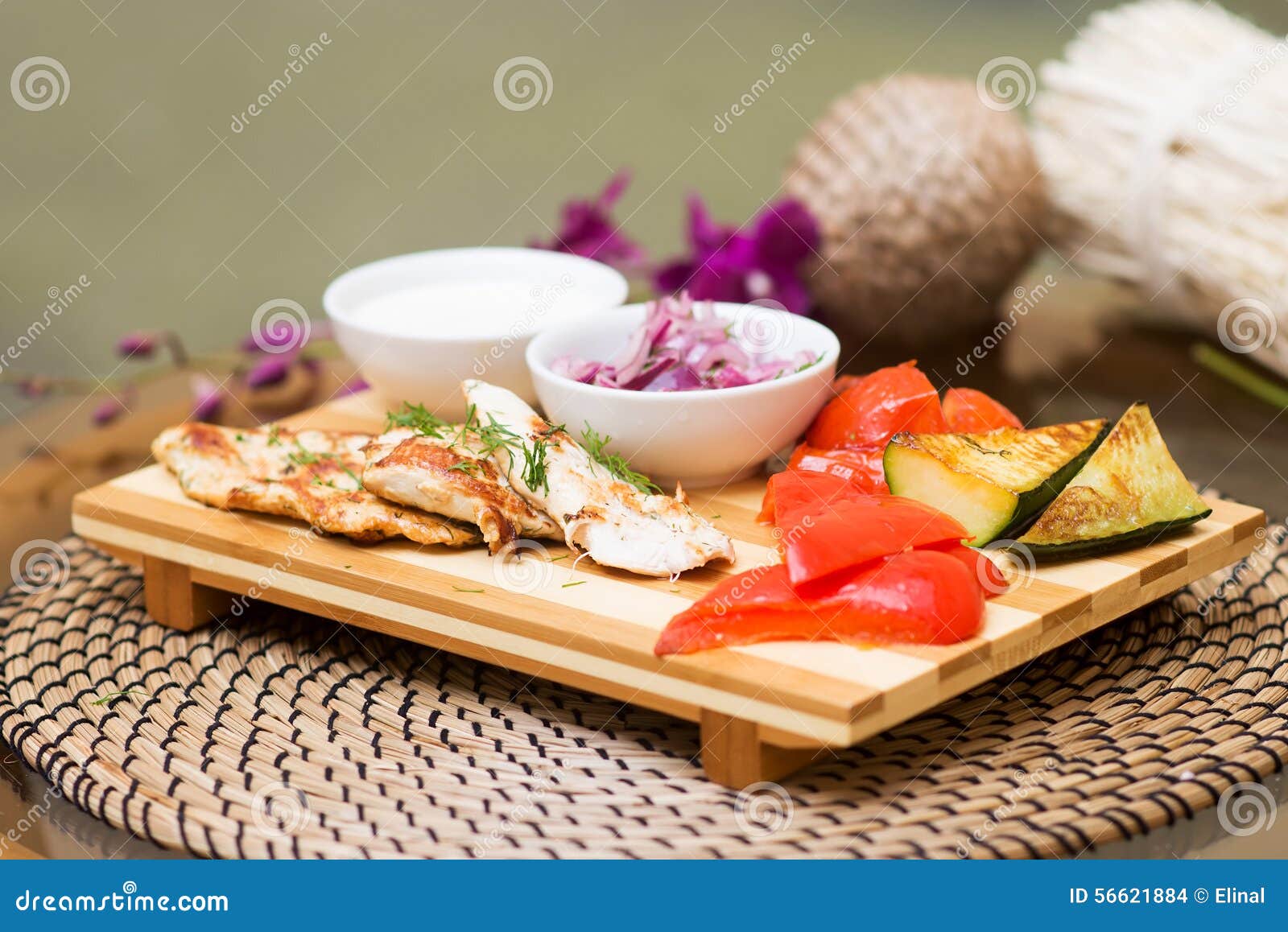 Grilled Chicken with Tomato, Eggplant, Radish, Vegetables Stock Photo