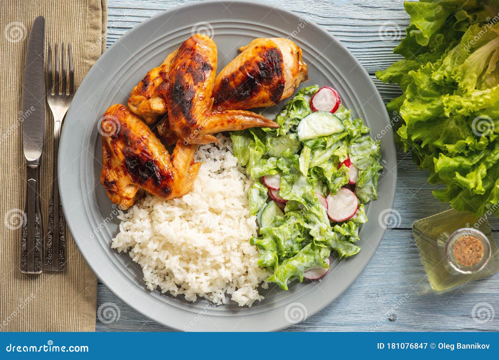 Grilled Chicken Wings and Drumsticks, Served with Boiled Rice and Salad