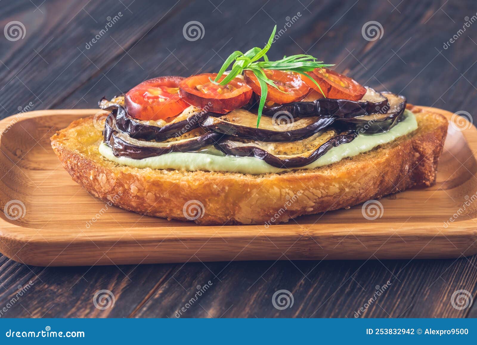Grilled eggplant sandwich stock photo. Image of avocado 253832942
