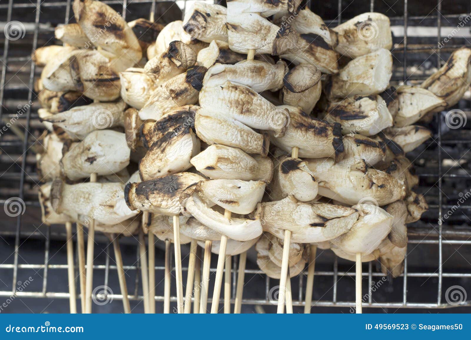 Grilled eringe mushrooms stock image. Image of charcoal - 49569523