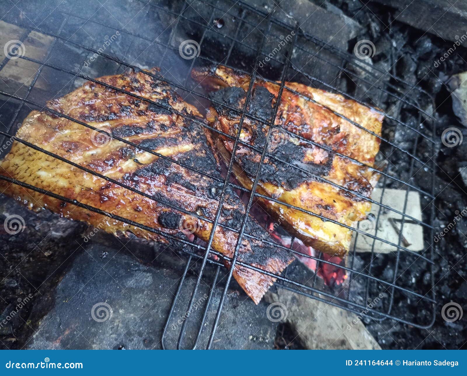 Grilled fish barramundi stock photo. Image of meal, dish 241164644