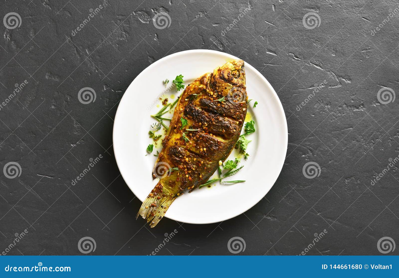 Grilled fish on plate stock photo. Image of grill, meal 144661680