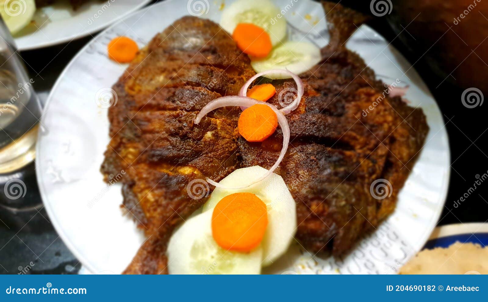 Grilled Fish on the Plate Ready To Serve Stock Photo Image of food, dessert 204690182