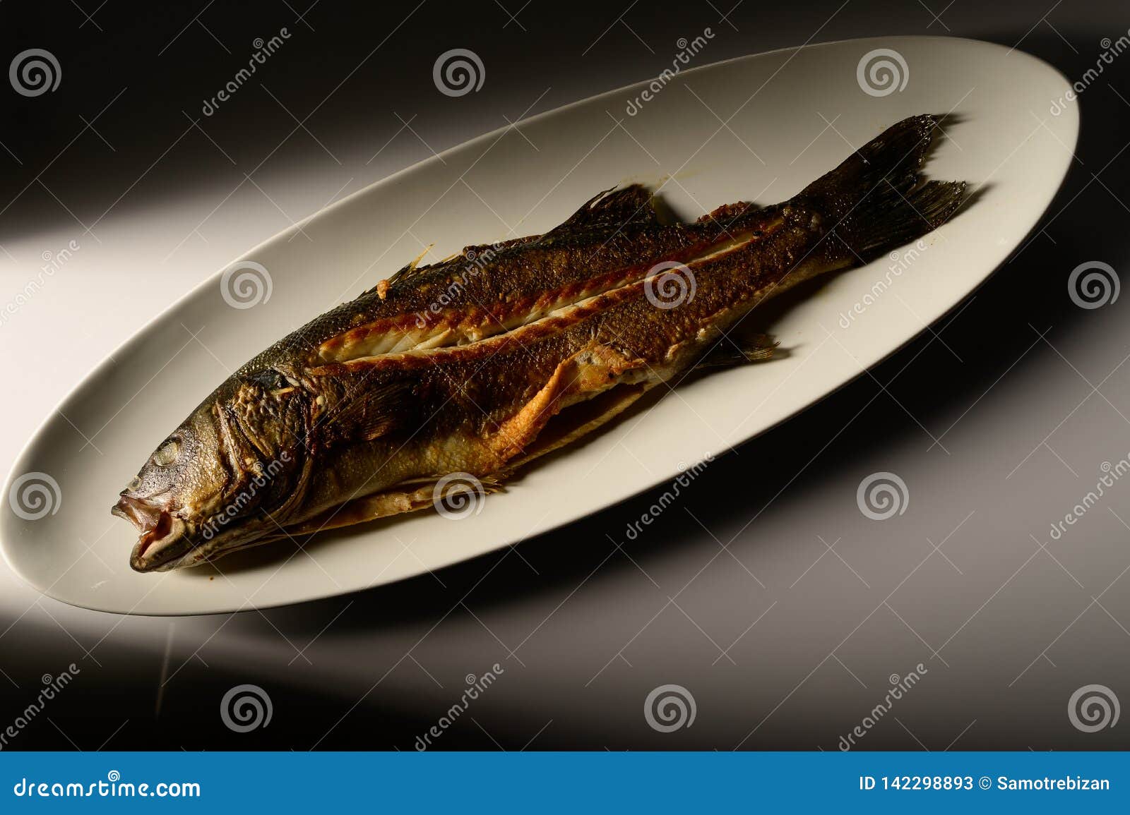 Grilled Fish Served on a Plate in Restaurant Stock Image Image of