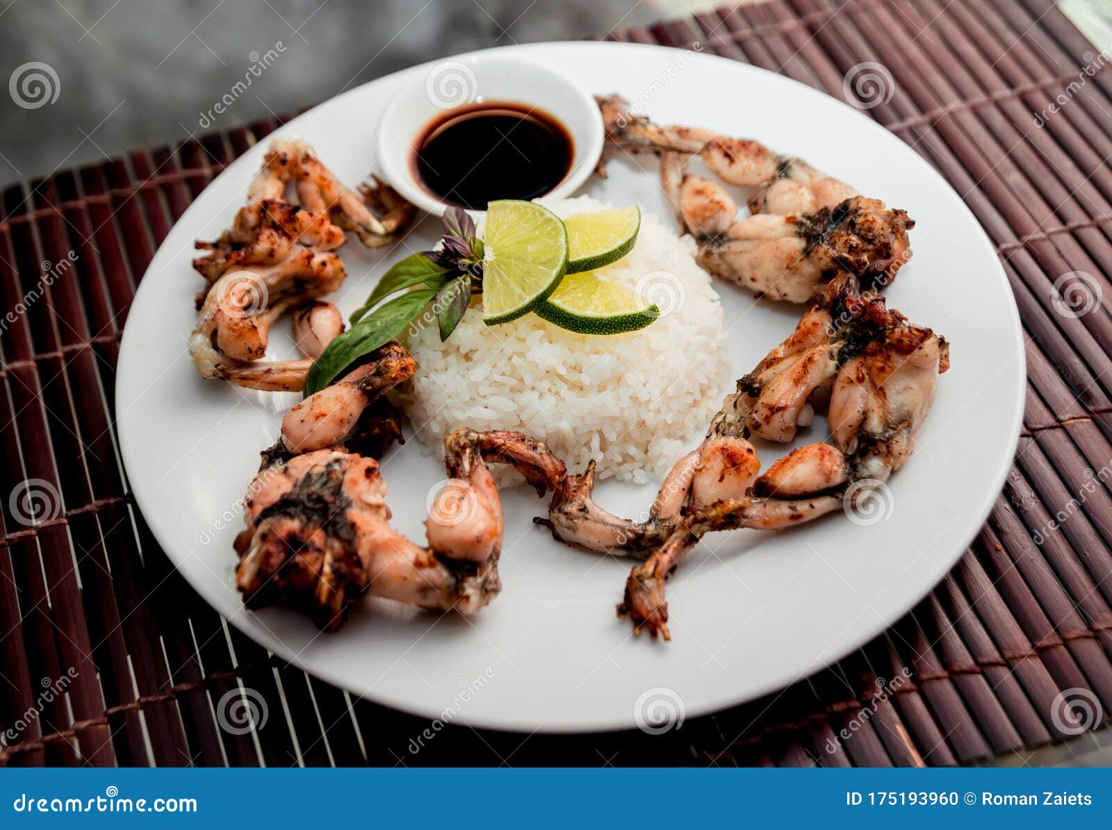 Grilled Frog Legs on the White Plate Stock Photo - Image of fillet ...