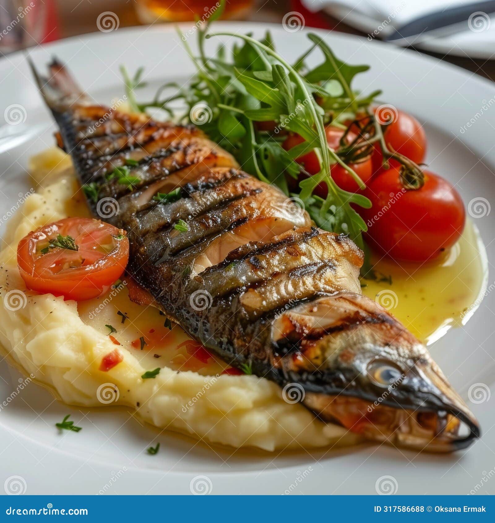 grilled mackerel with mashed potatoes and tomatoes, fried scomber fillet