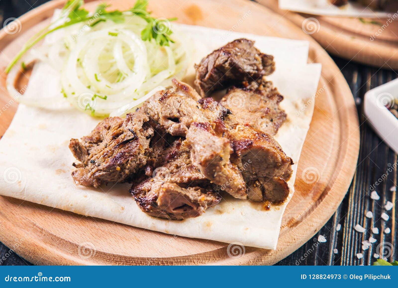 Grilled meat with onion stock image. Image of event - 128824973