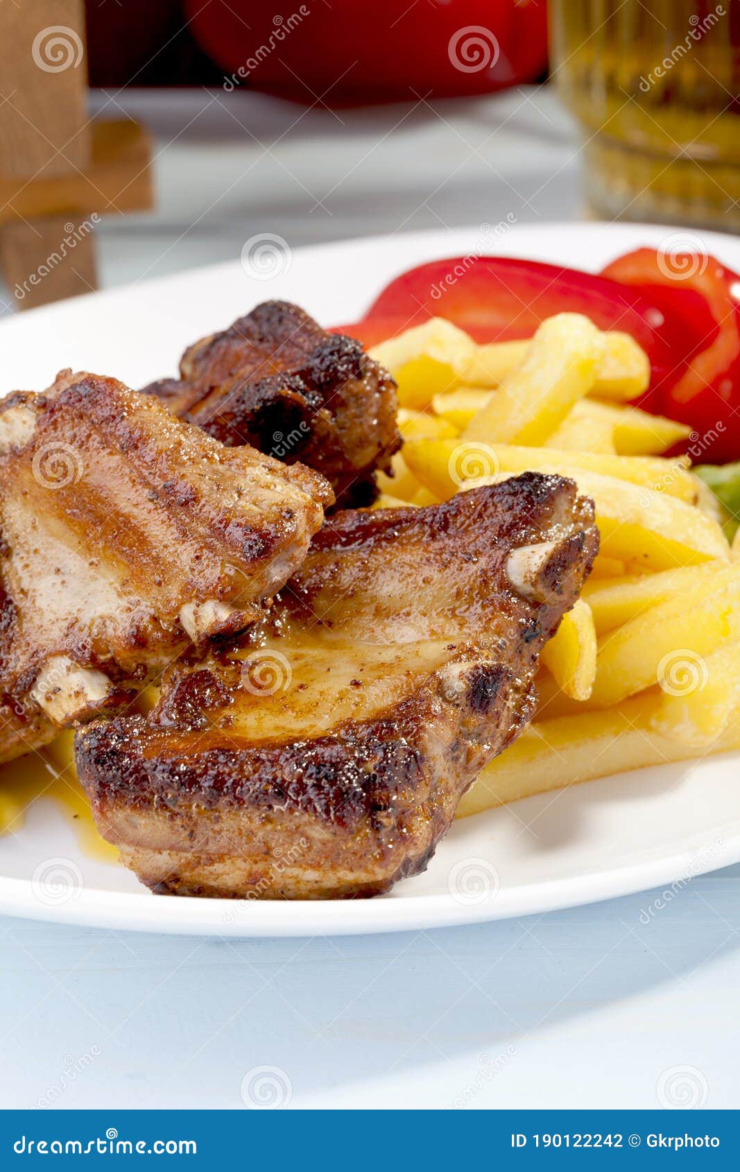 Grilled ribs on plate stock photo. Image of meal, rack 190122242
