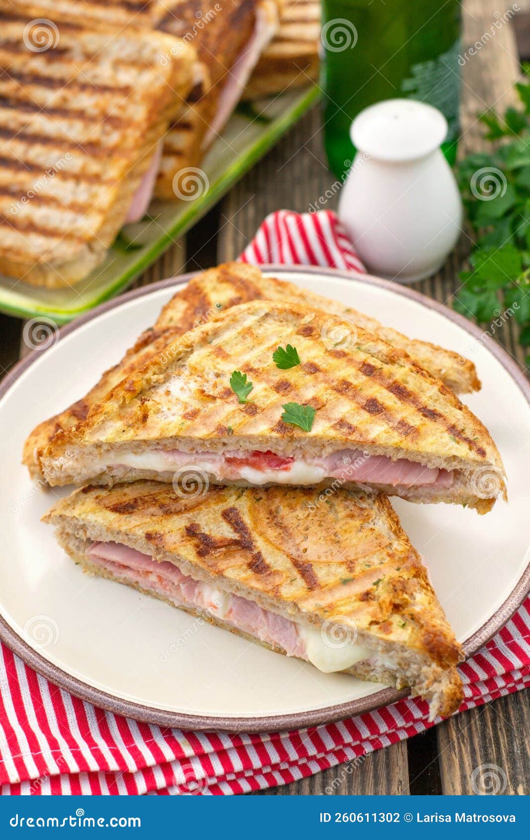 Grilled Sandwich with Ham, Mozzarella Cheese and Tomato Stock Photo