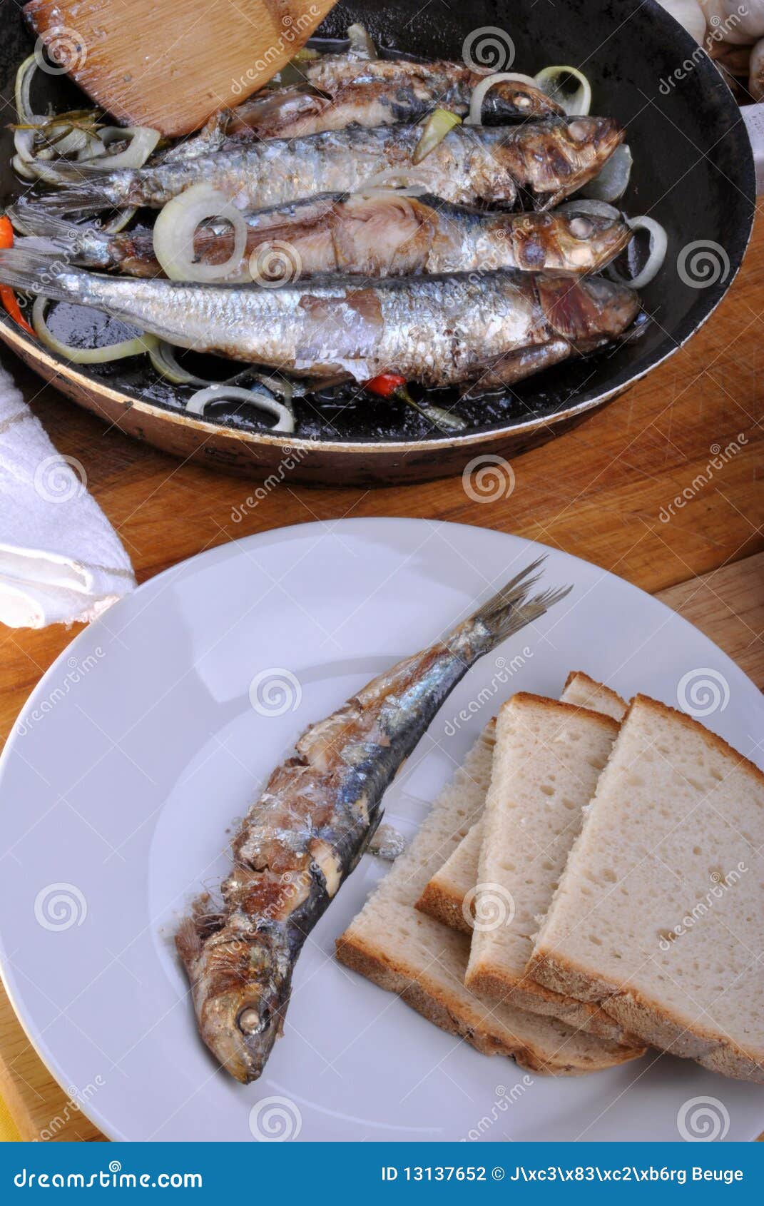 Grilled sardine in a pan stock photo. Image of gastronomy 13137652