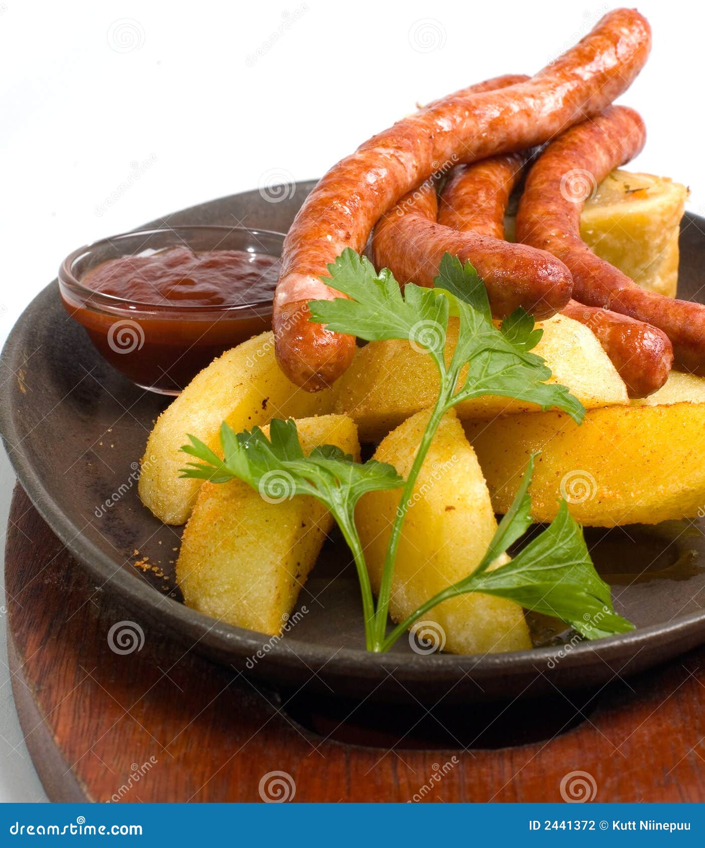 Grilled sausage platter stock photo. Image of sauerkraut 2441372