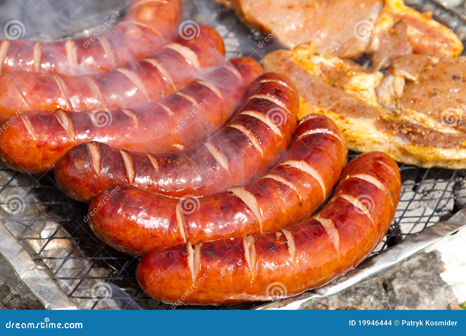 Grilled sausages and pork stock photo. Image of burning 19946444