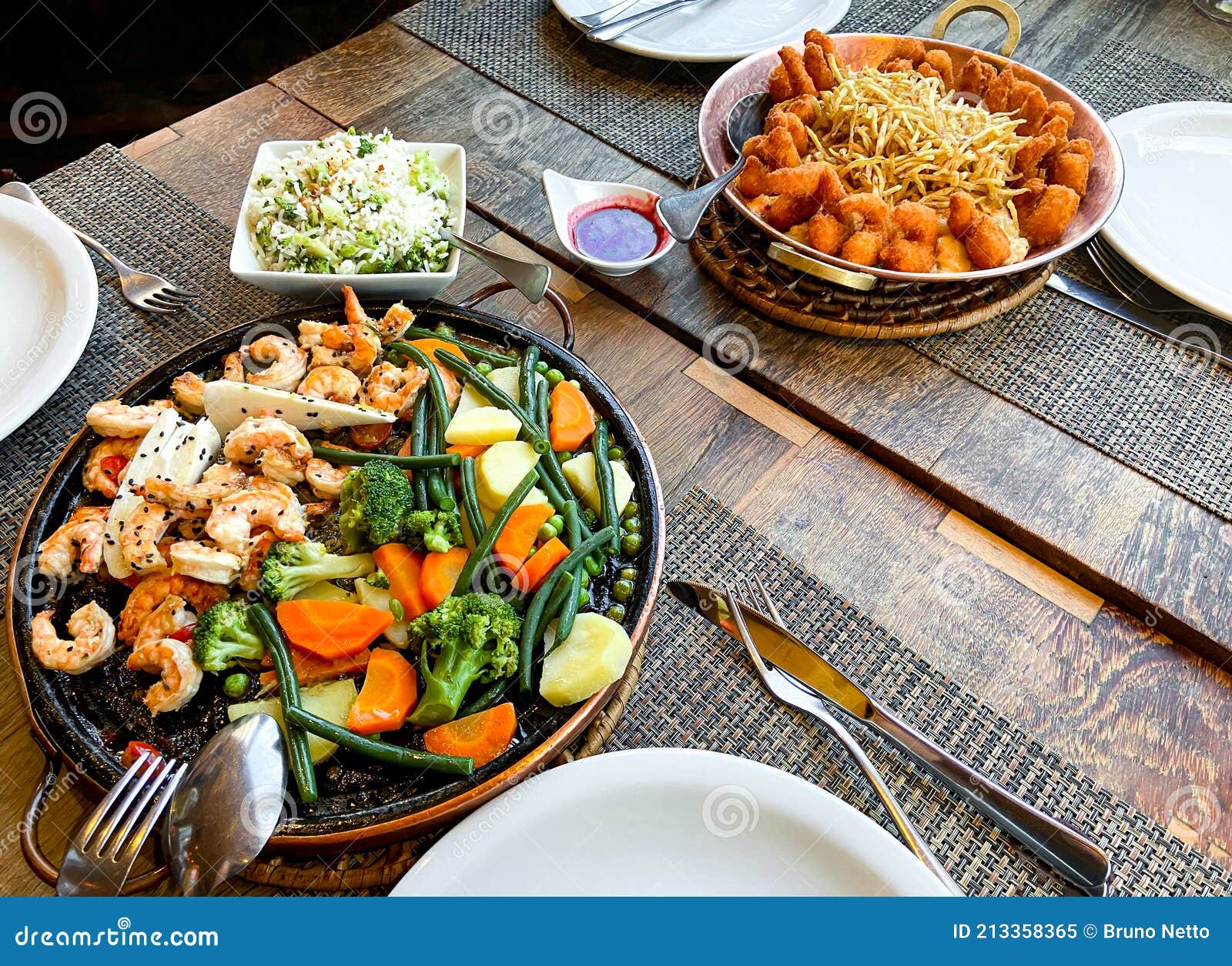 Grilled Shrimp and Breaded Shrimp Served on the Table Stock Image