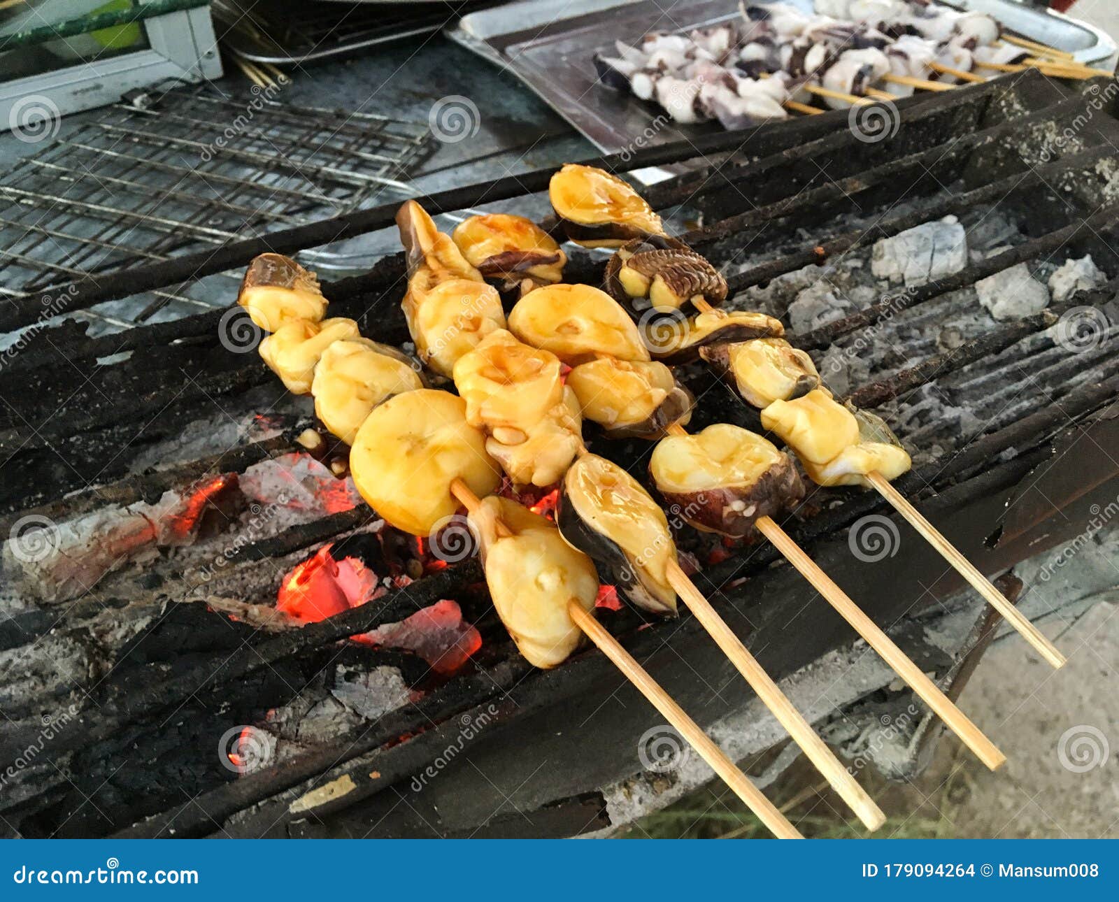 Grilled squid on stove stock photo. Image of squid, iron 179094264