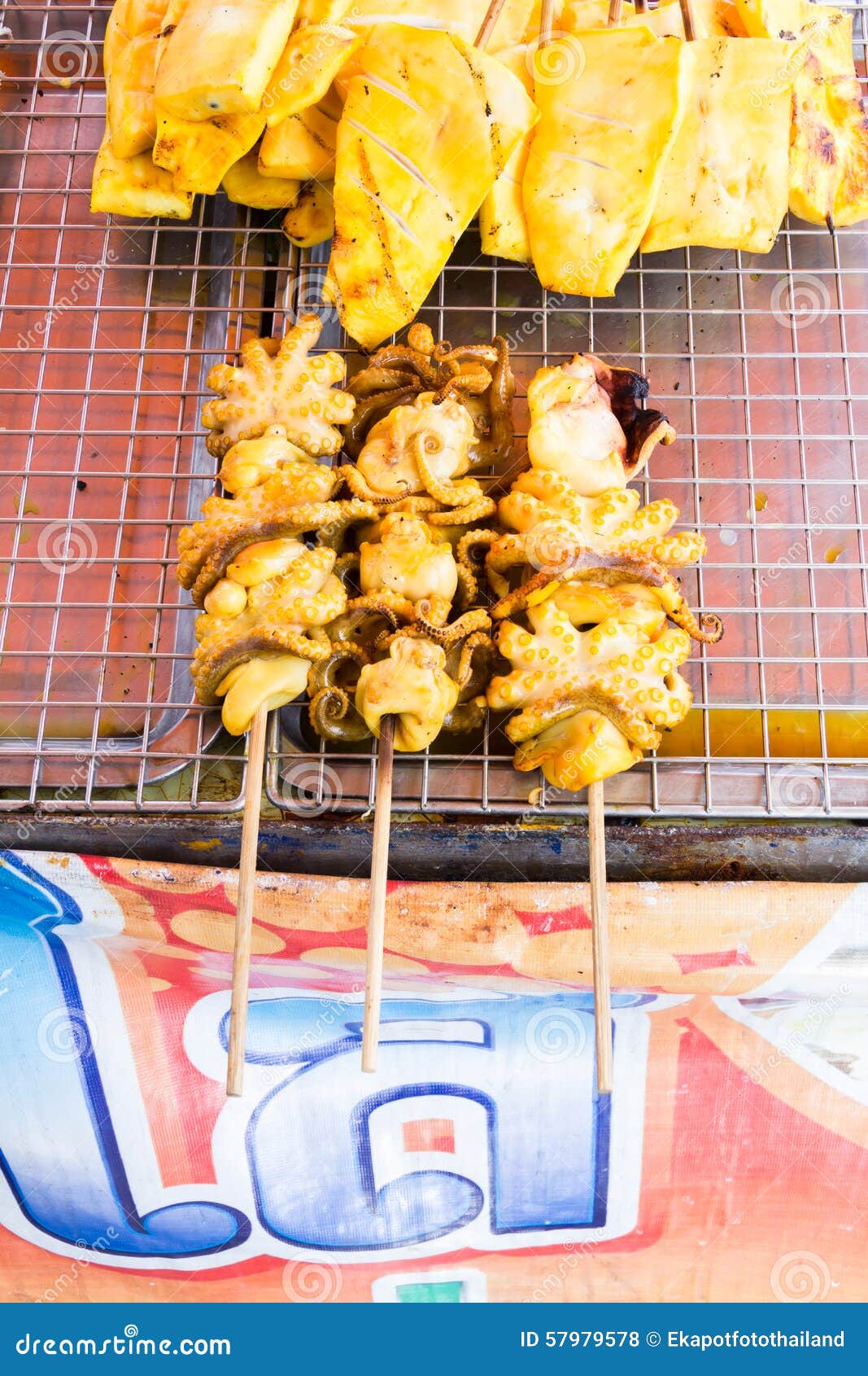 Grilled squid on stove stock photo. Image of dinner, green 57979578