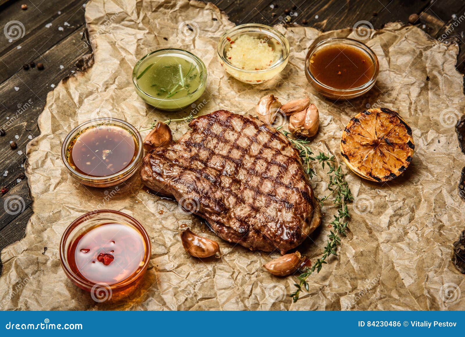Grilled Steak with Different Sauces, on Parchment. Vertical Top View Stock Photo Image of