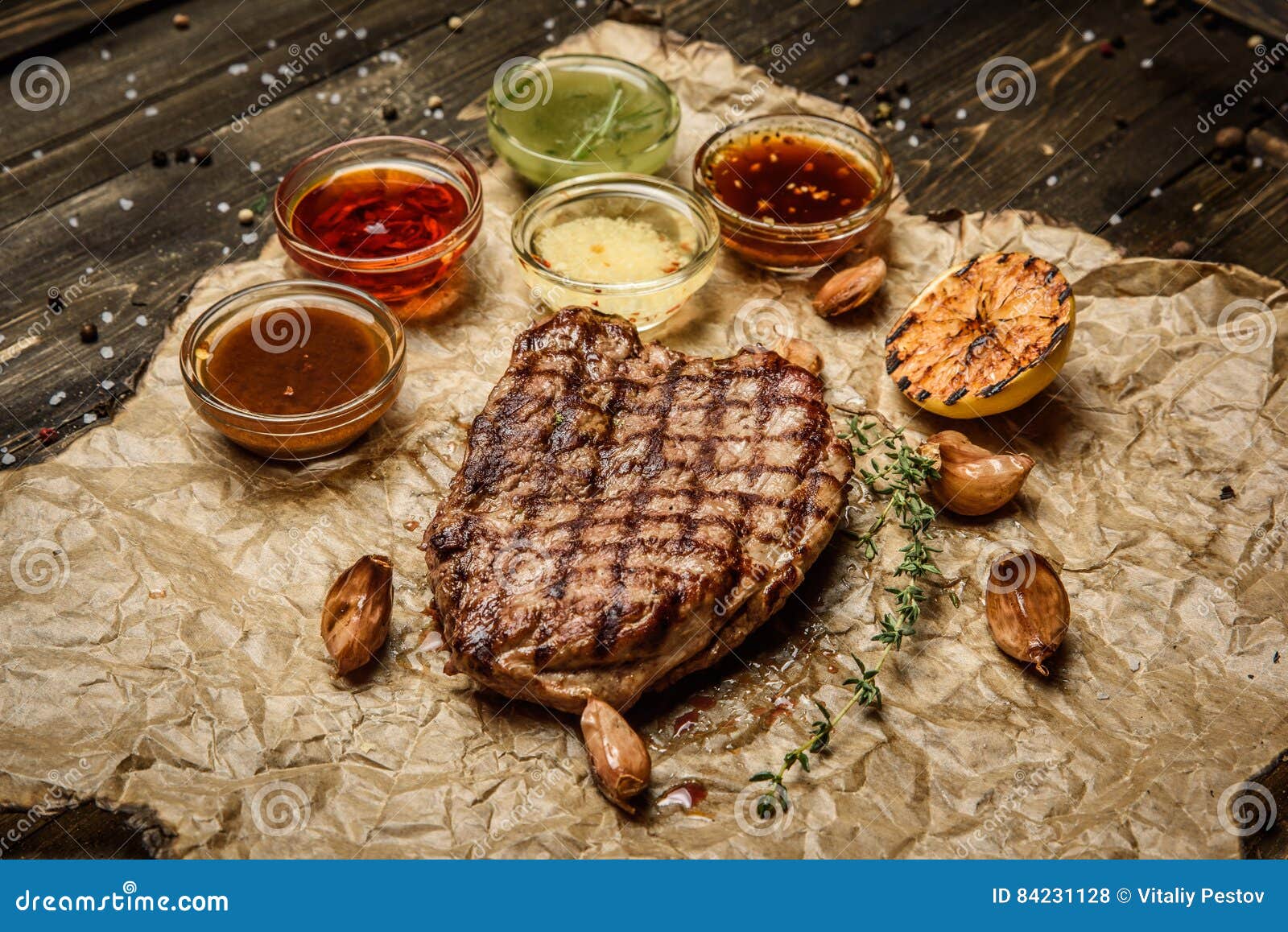 Grilled Steak with Different Sauces, on Parchment. Vertical Top View Stock Photo Image of