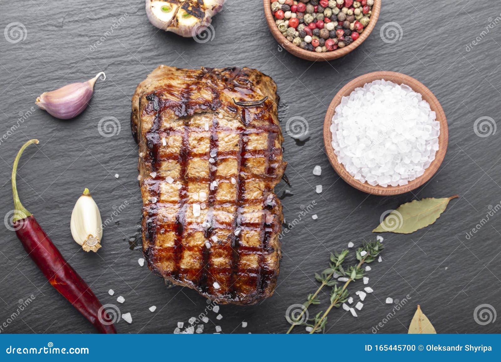 Grilled steak with spices stock photo. Image of fillet 165445700