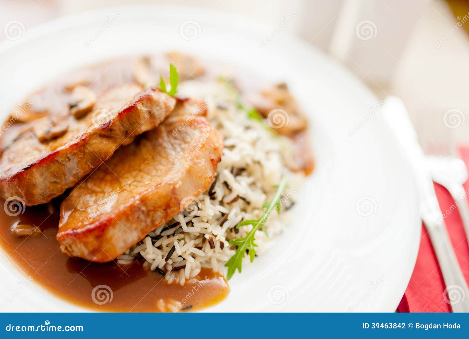 Grilled Succulent Pork Chop and Rice As Main Course Stock Photo - Image