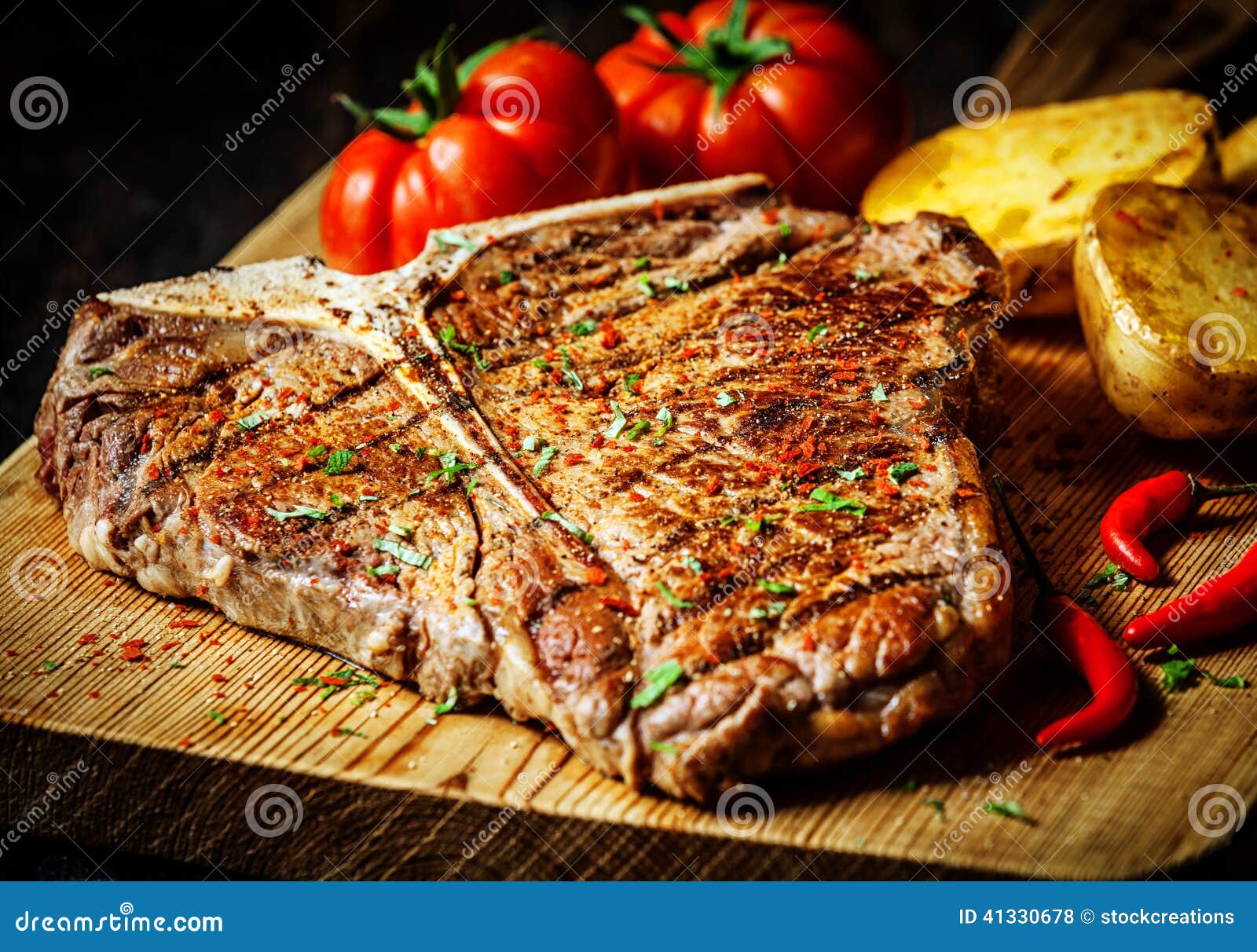 grilled t-bone steak with vegetables