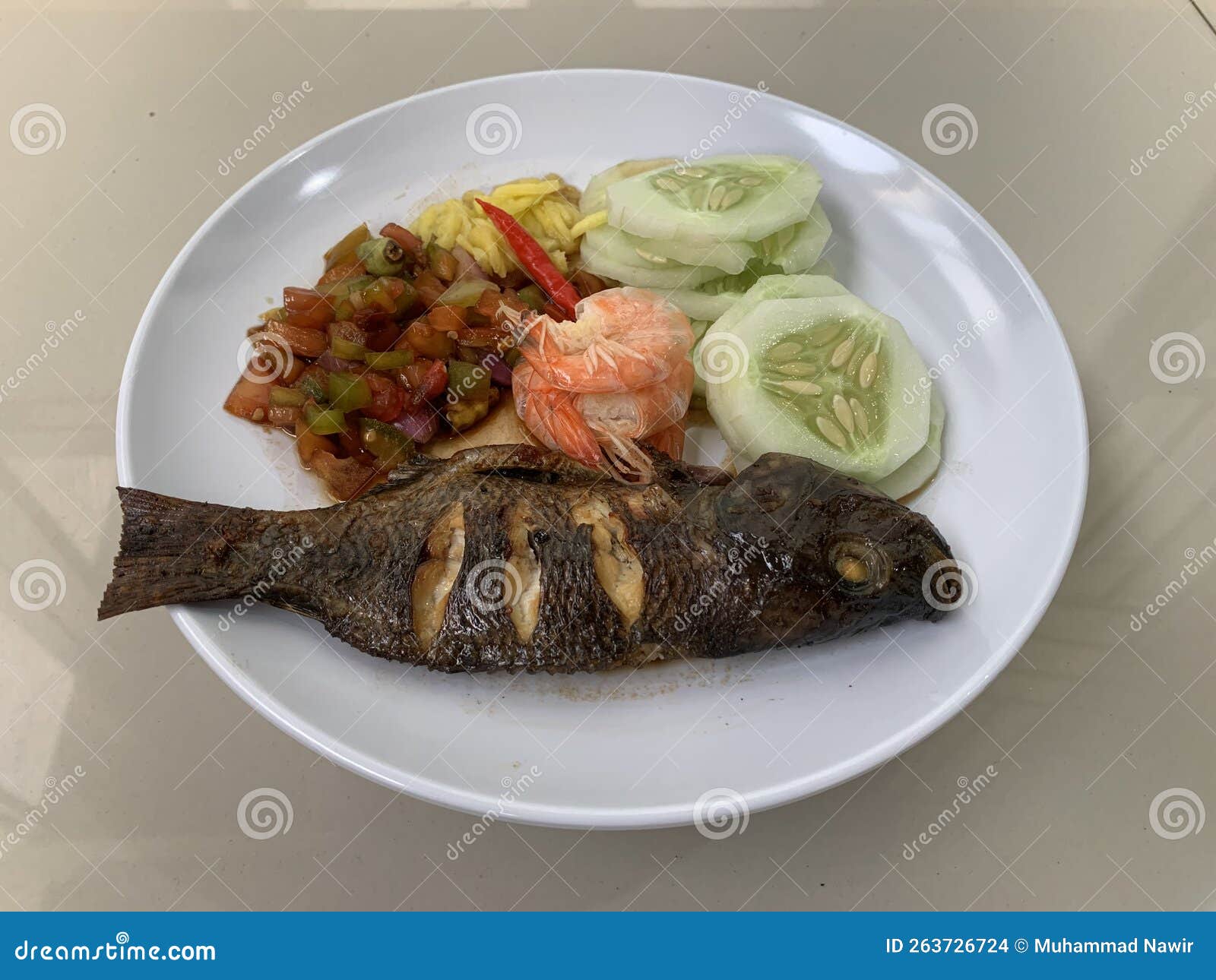 Grilled Tilapia with Chunks of Mango, Tomato, Cucumber, and Boiled