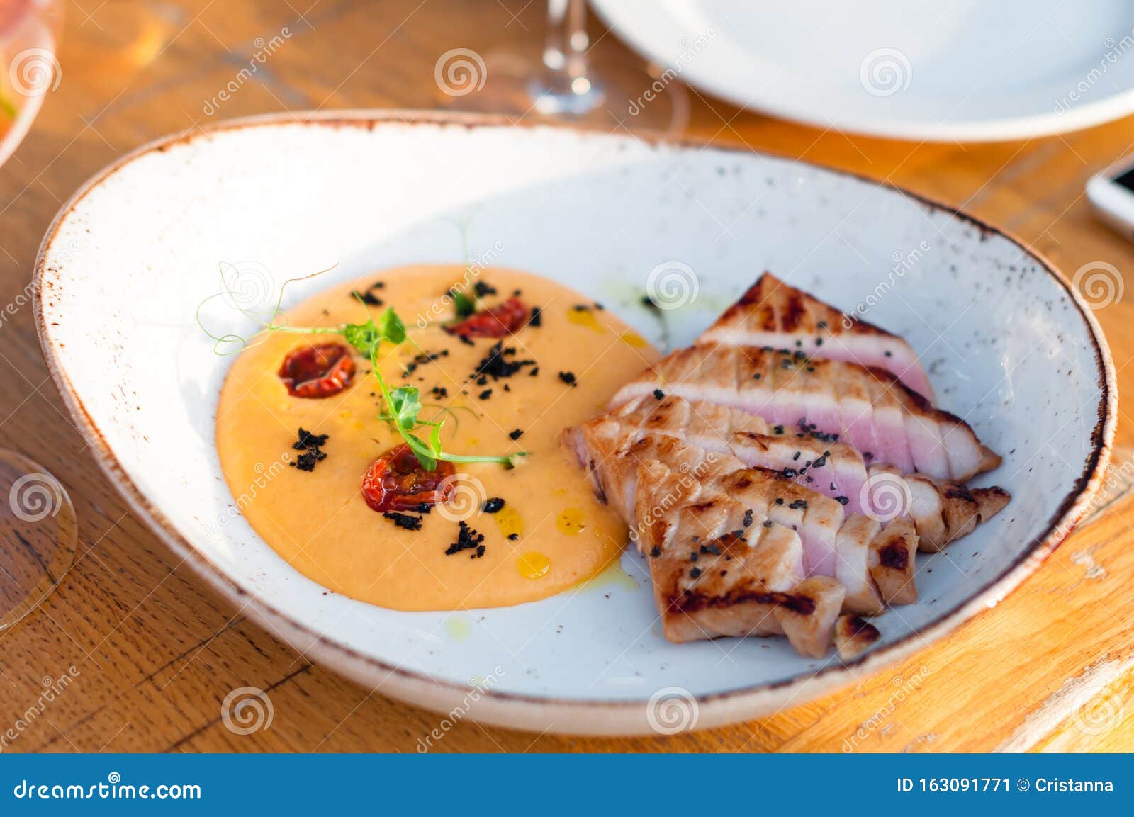Grilled Tuna Steak with Pumpkin Puree As Side Dish Stock Image - Image
