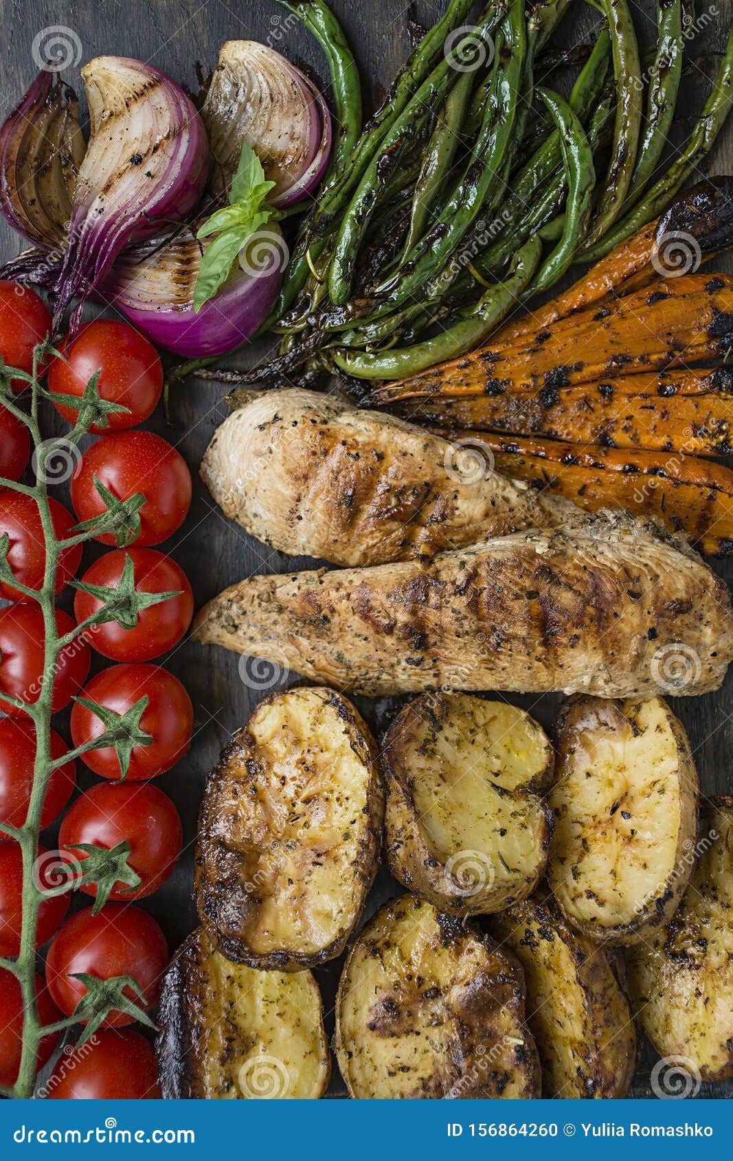 Grilled Vegetables on a Cutting Board on a Dark Wooden Background. Dark ...