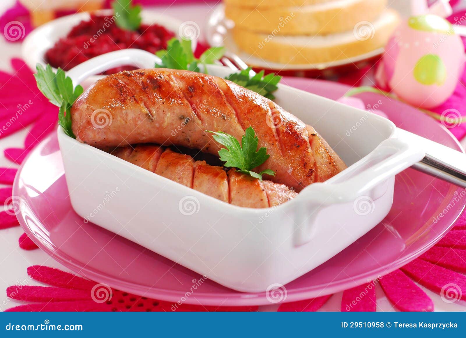 Grilled White Sausage with Beetroot Sauce for Easter Stock Photo