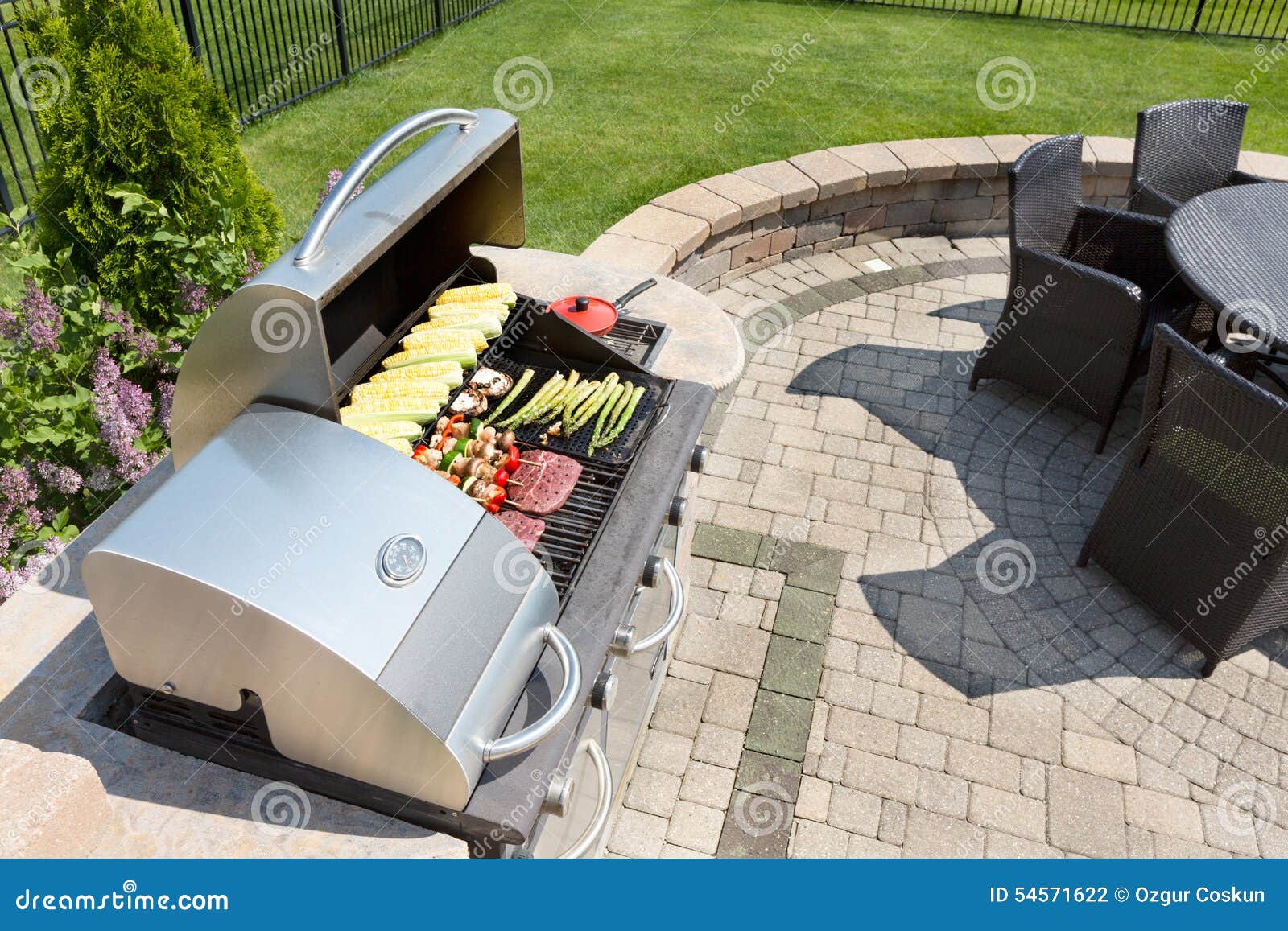 grilling food on an outdoor gas barbecue
