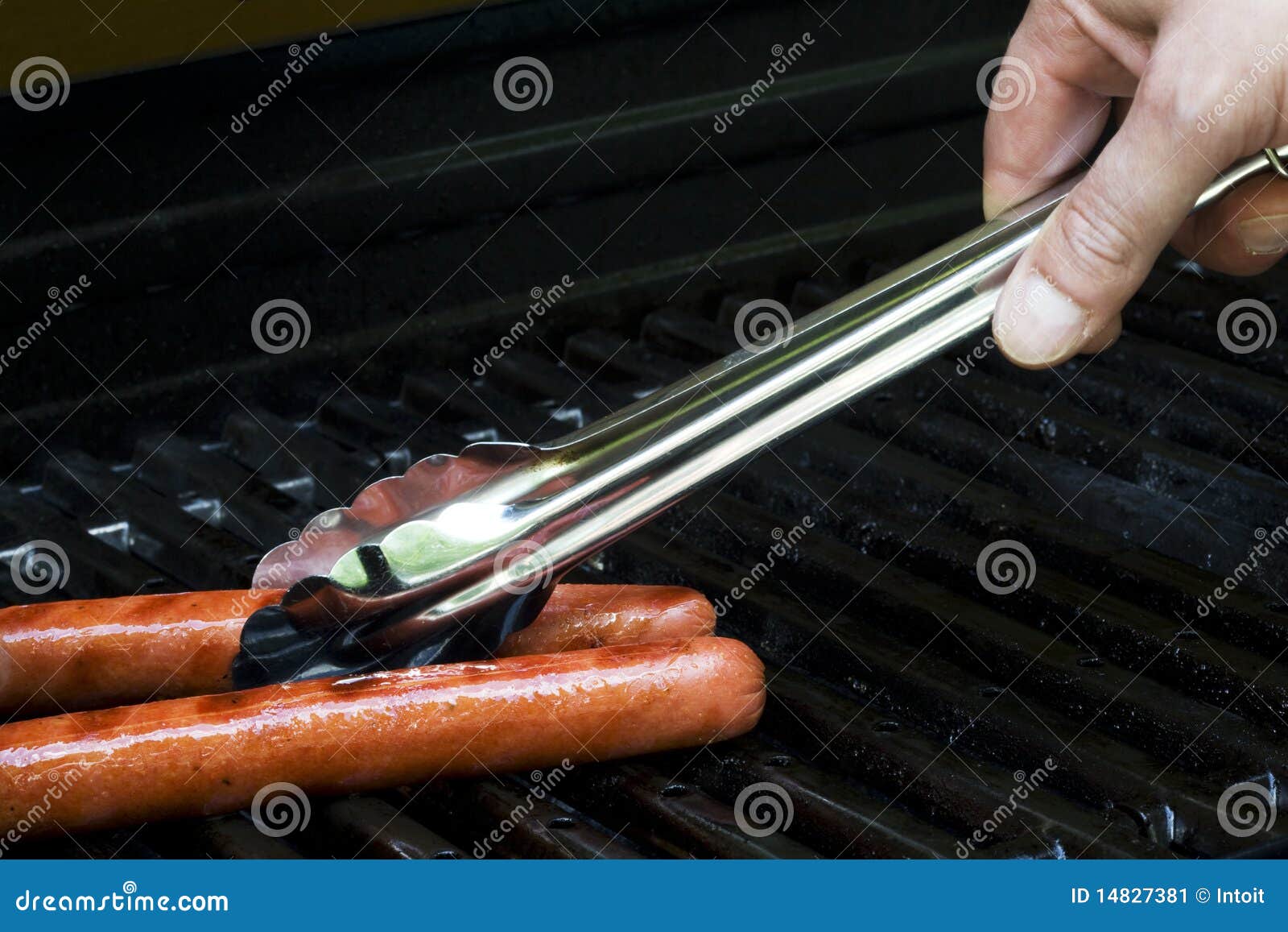 Grilling Hot Dogs stock image. Image of meal, tongs, diet 14827381