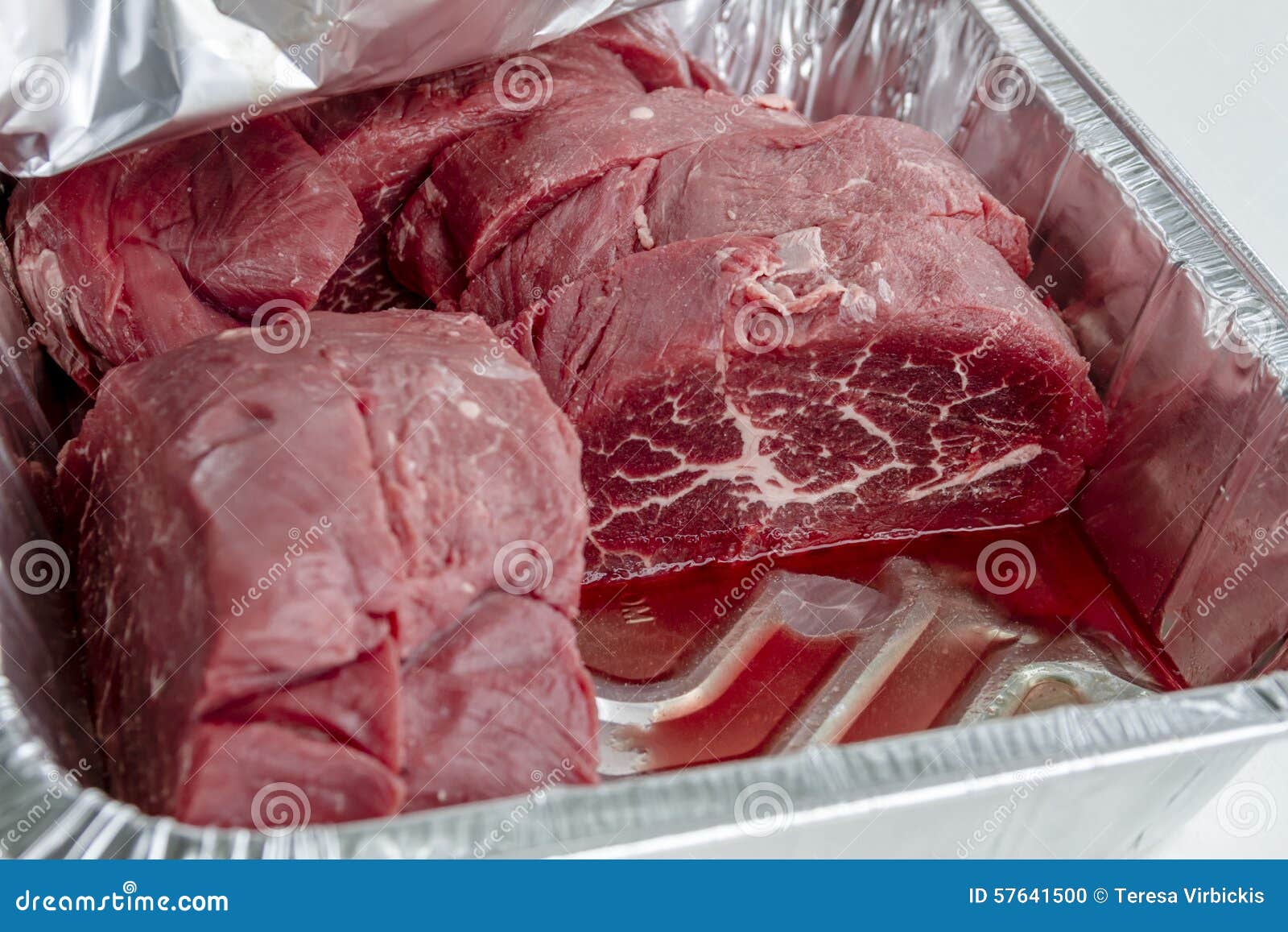 grilling meats at outdoor picnic