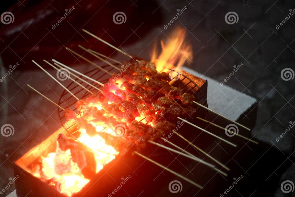 Grilling Satay or Chicken Skewer on Top of Coal Stock Image - Image ...
