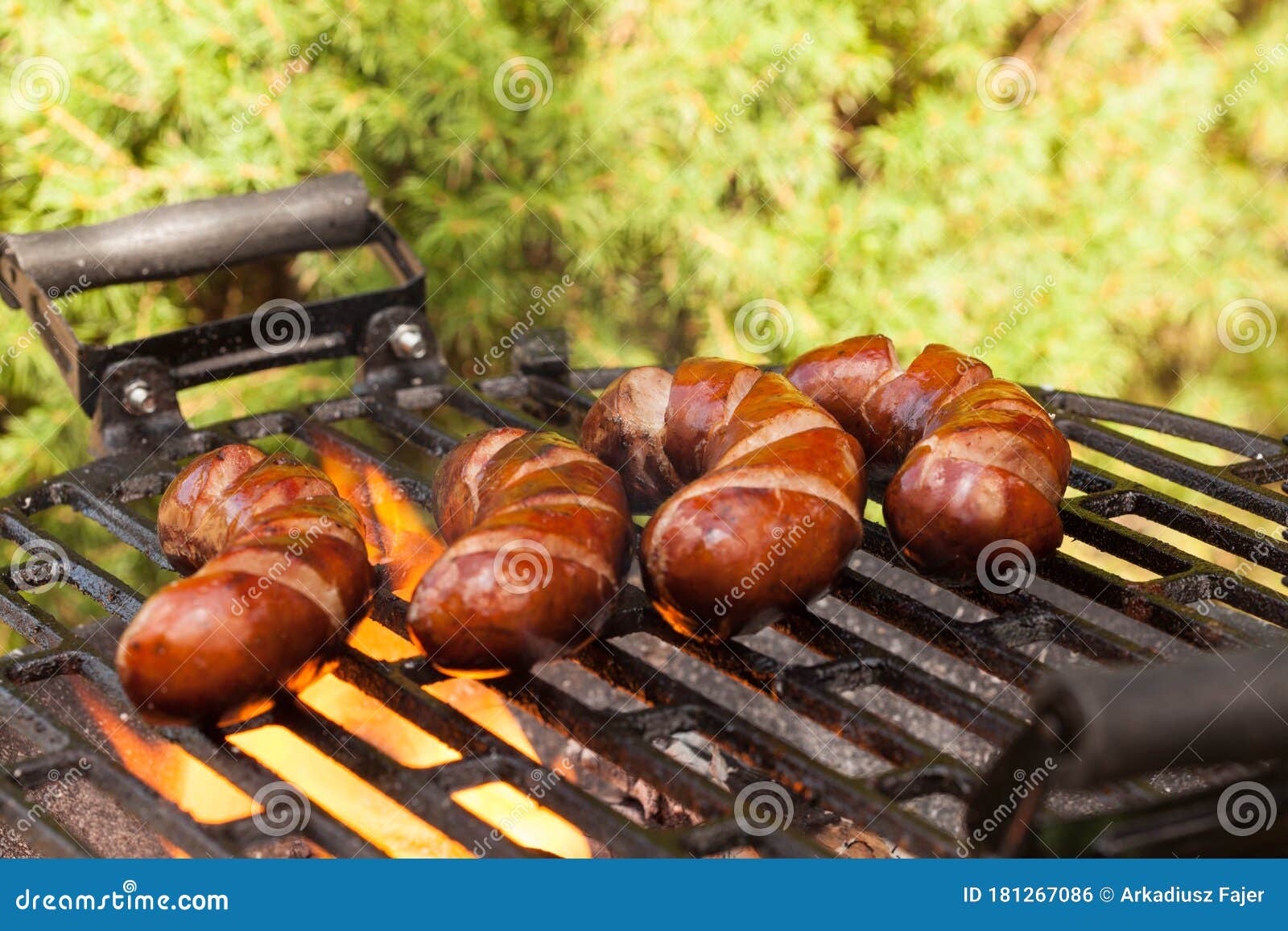 Grilling sausages stock photo. Image of cooking, grill 181267086