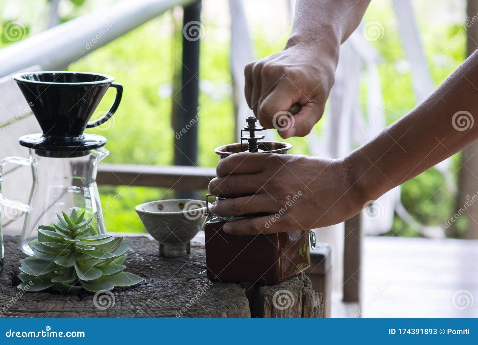 Grinding Coffee Beans To Make Dripped Coffee Stock Image Image of