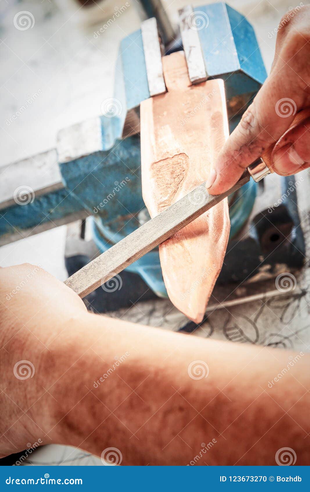 Grinding the Copper Billet with a File Stock Photo Image of factory, construction 123673270