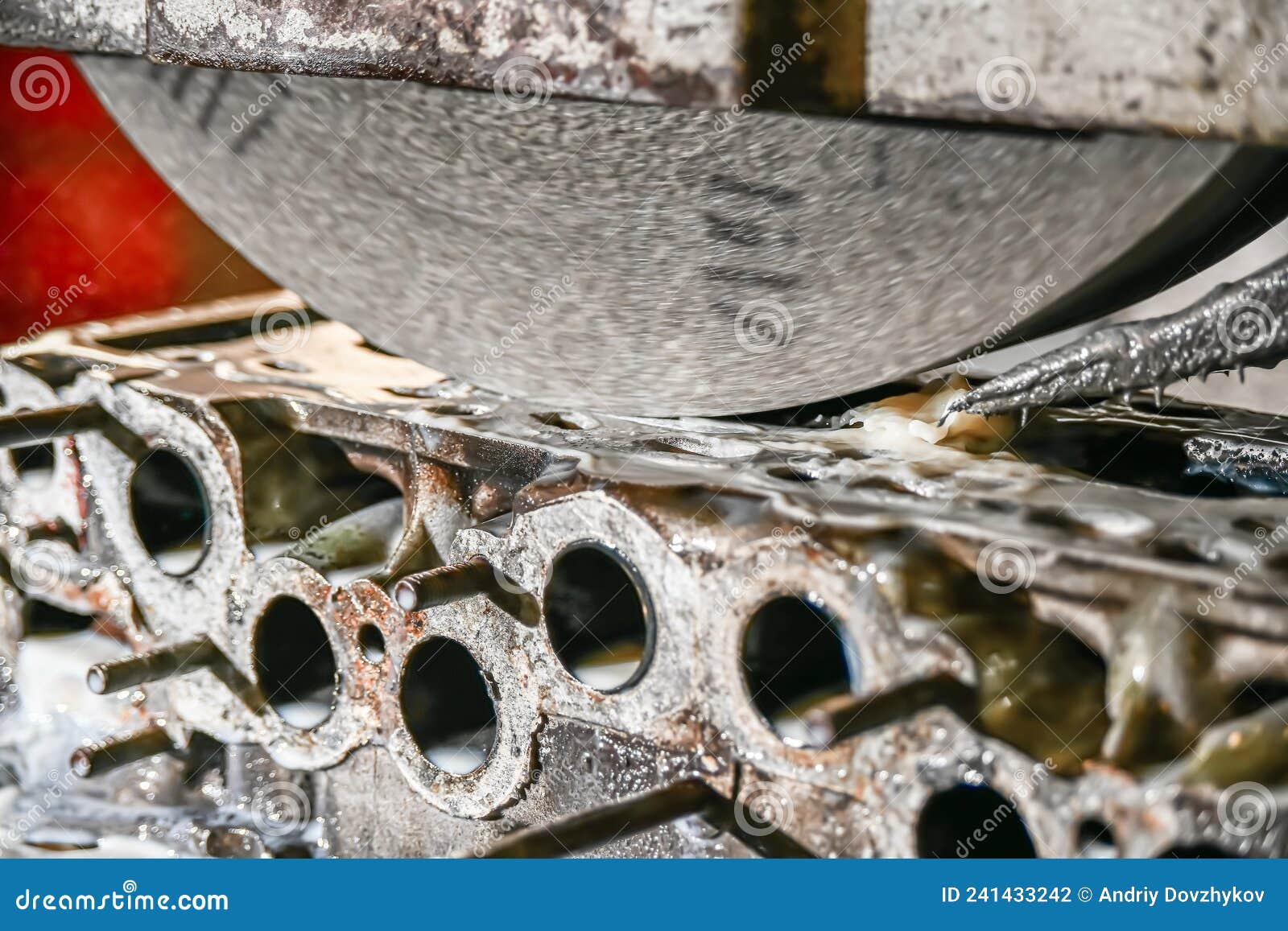 Grinding the Cylinder Head of a Car Engine on a Watercooled Surface