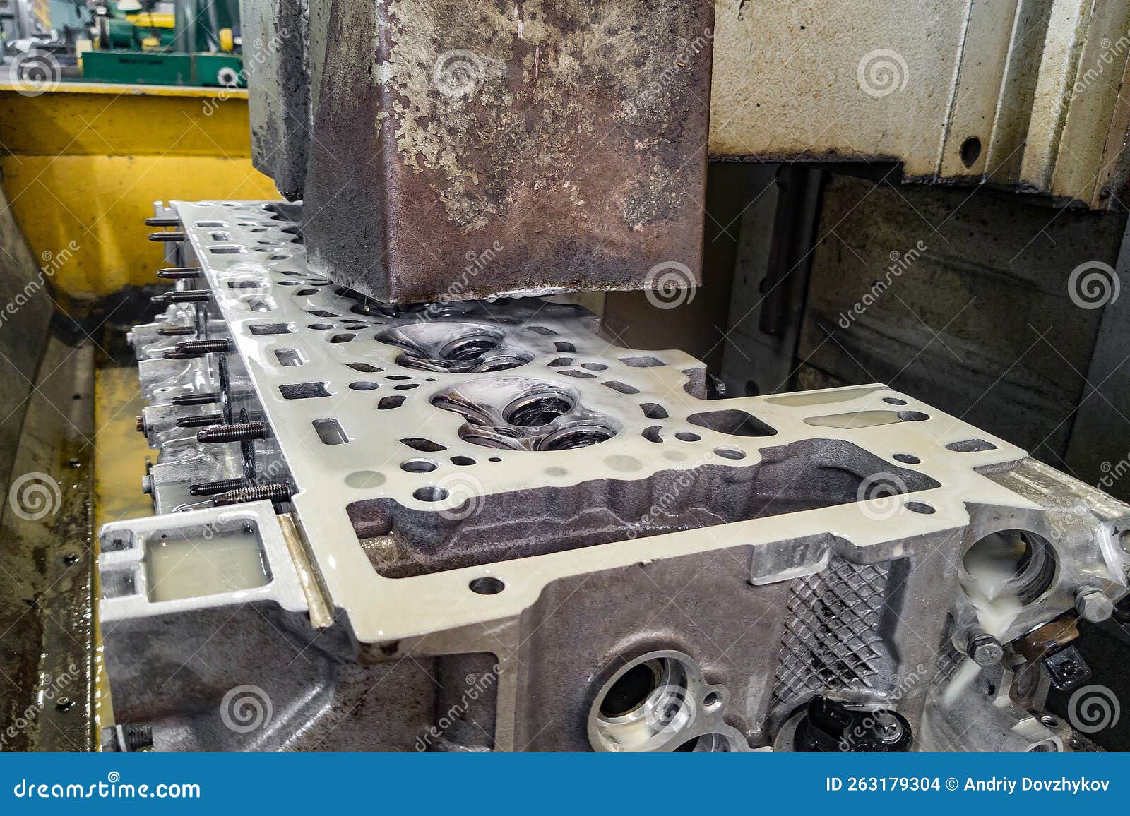 Grinding the Head of a Sixcylinder Engine on a Surface Grinder Stock