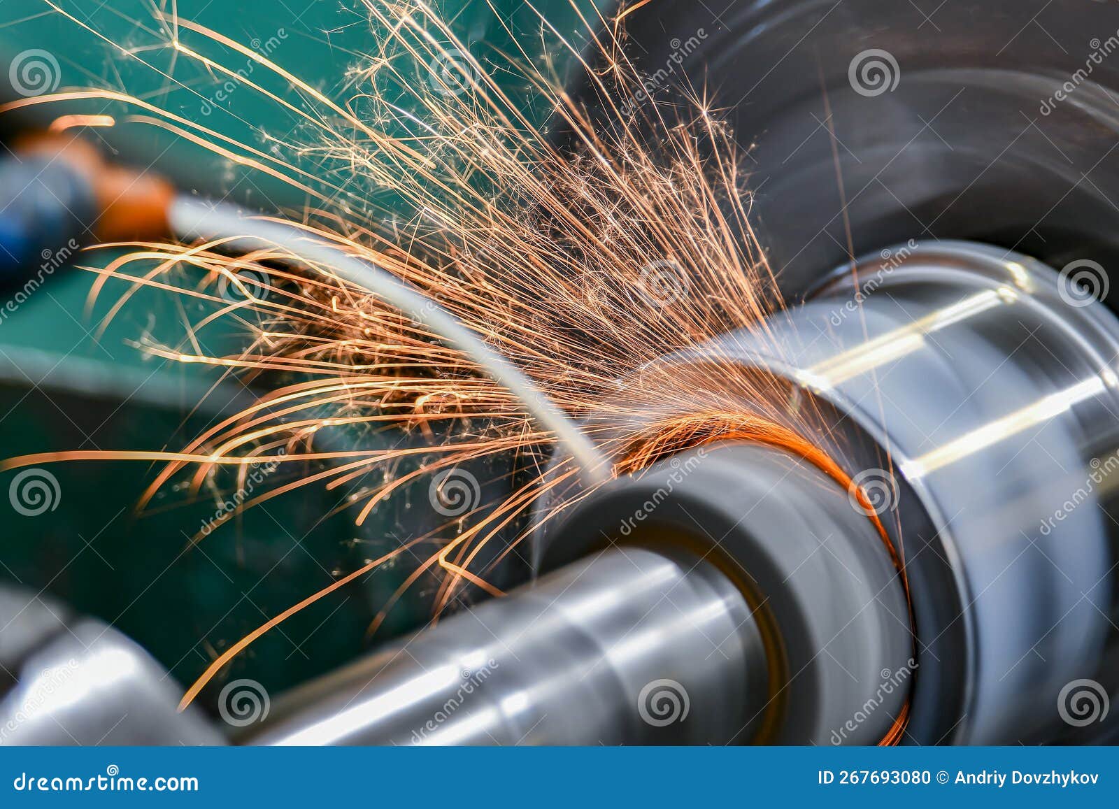 Grinding the Hole on a Cylindrical Grinder with Coolant Stock Photo