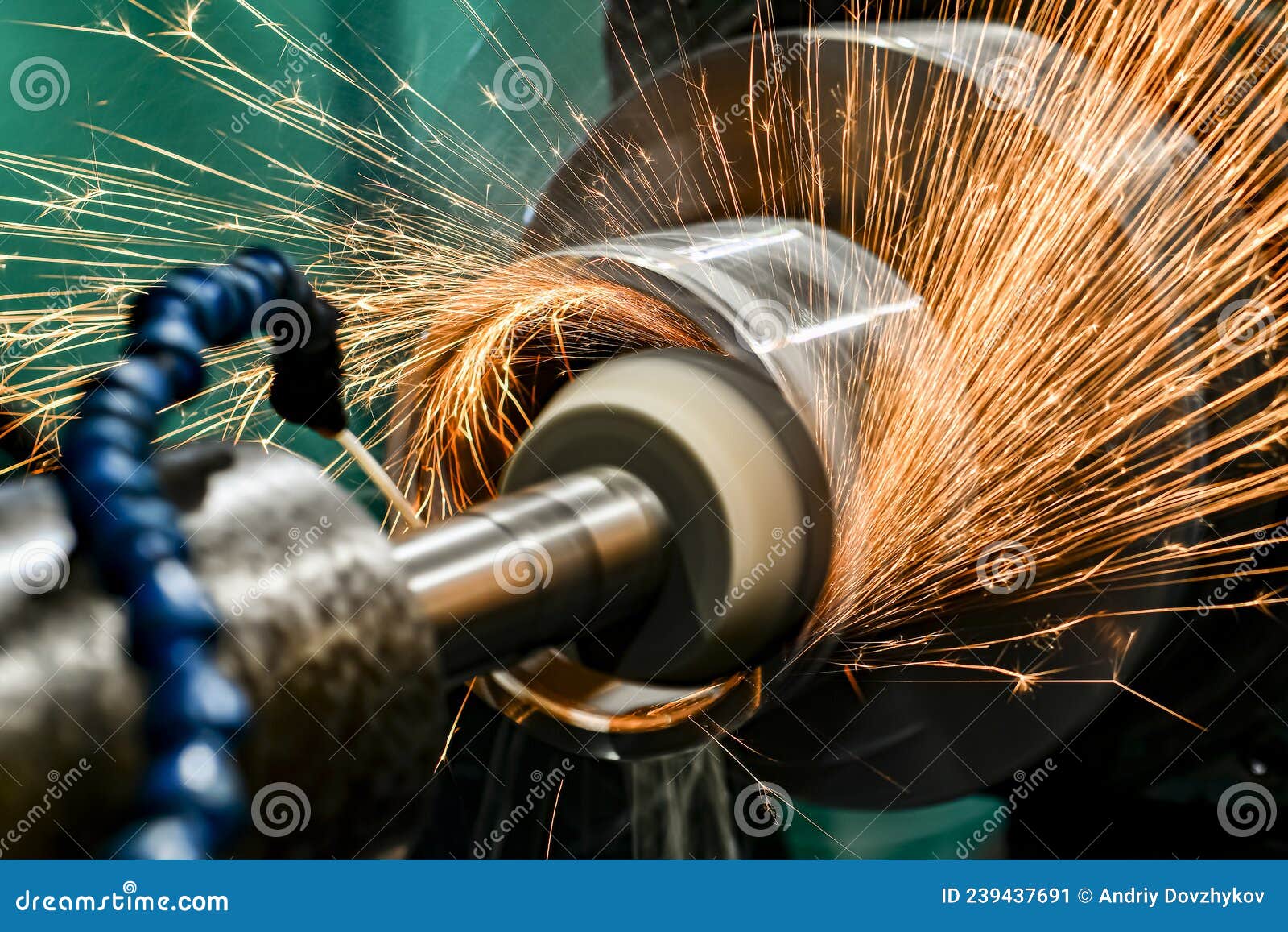 Grinding Metal with an Abrasive Wheel on a Circular Grinding Machine with Sparks. Metal