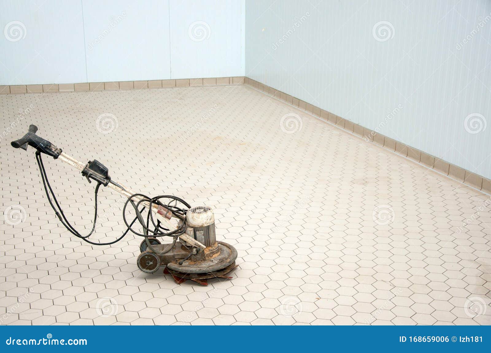 Closeup of Grinding Machine for Ceramic Tile at Workplace Stock Photo