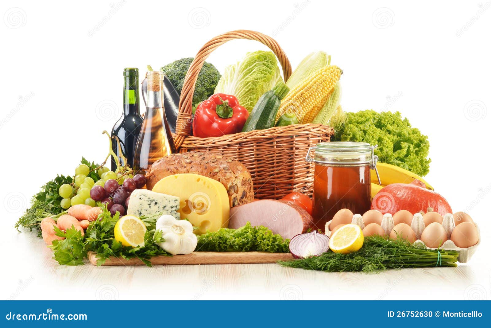 Groceries in Wicker Basket on Kitchen Table Stock Photo - Image of ...