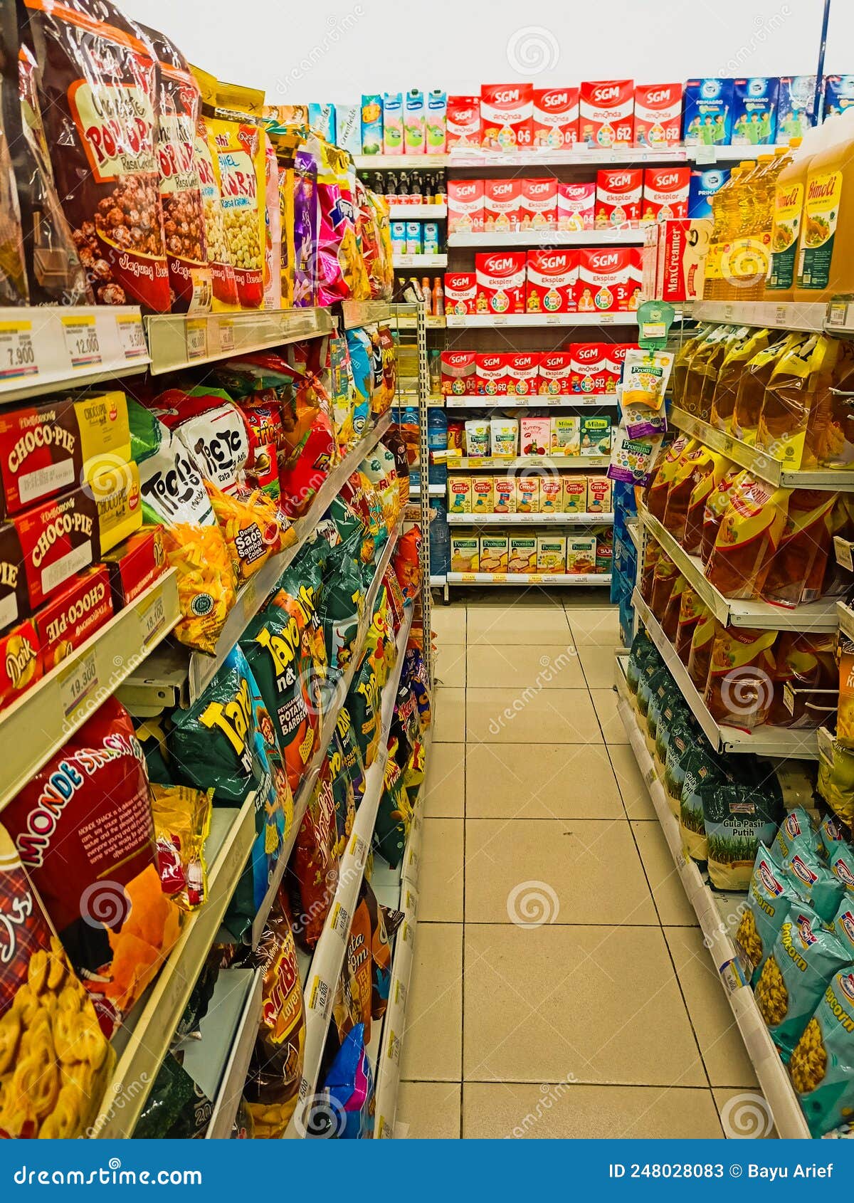 Grocery Store Aisle Full of Chips and Snacks Editorial Stock Photo
