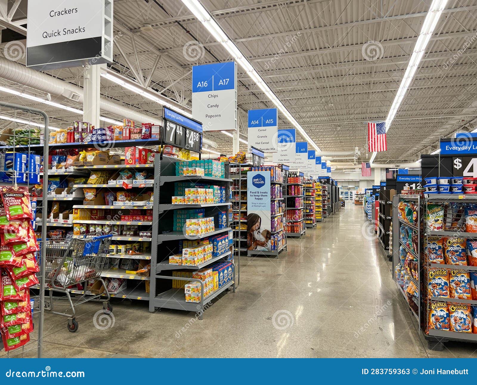 A Grocery Store Aisle at a Walmart Store with No People Editorial