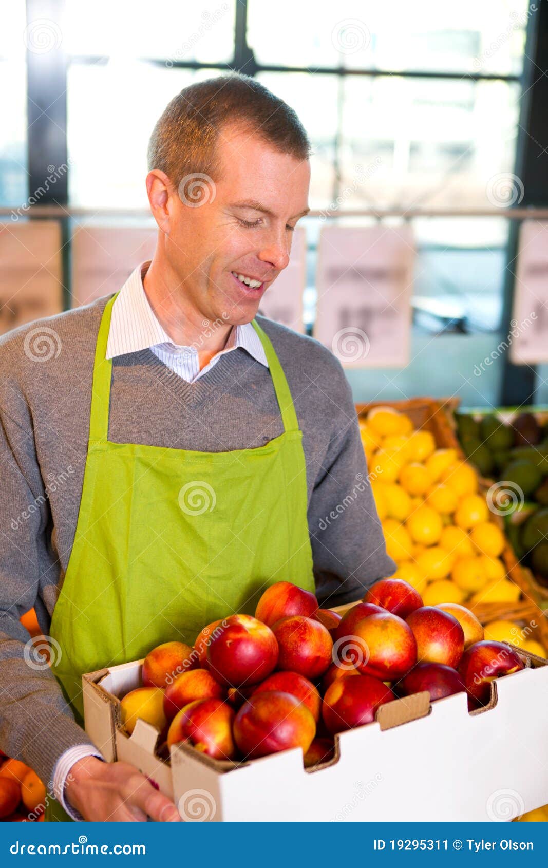 Grocery Store Peaches stock image. Image of retail, male 19295311