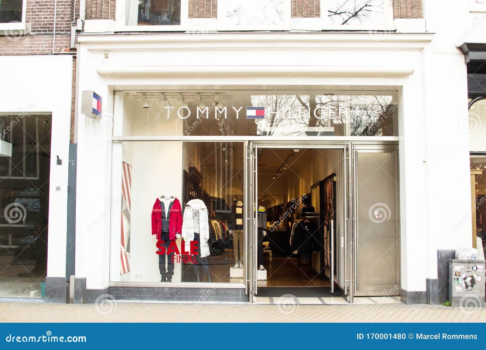 Entrance of a Tommy Hilfiger Store in Groningen Editorial Image - Image ...