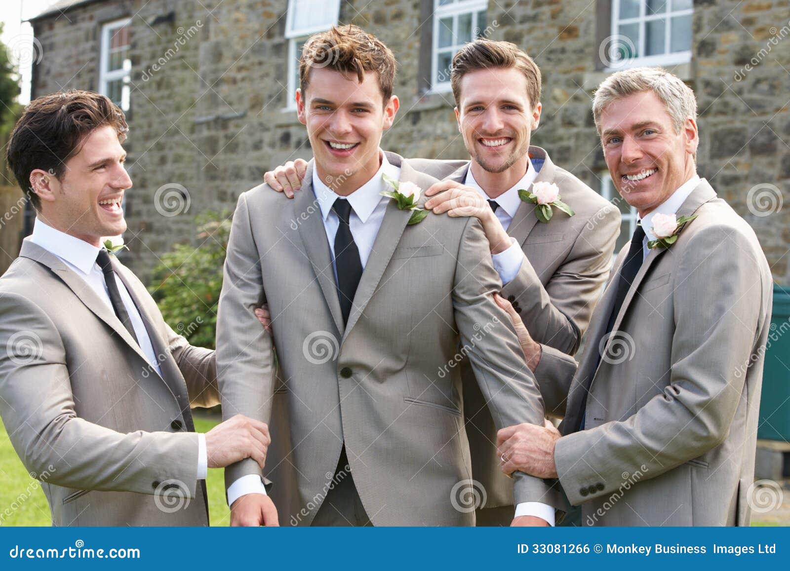groom with best man and groomsmen at wedding
