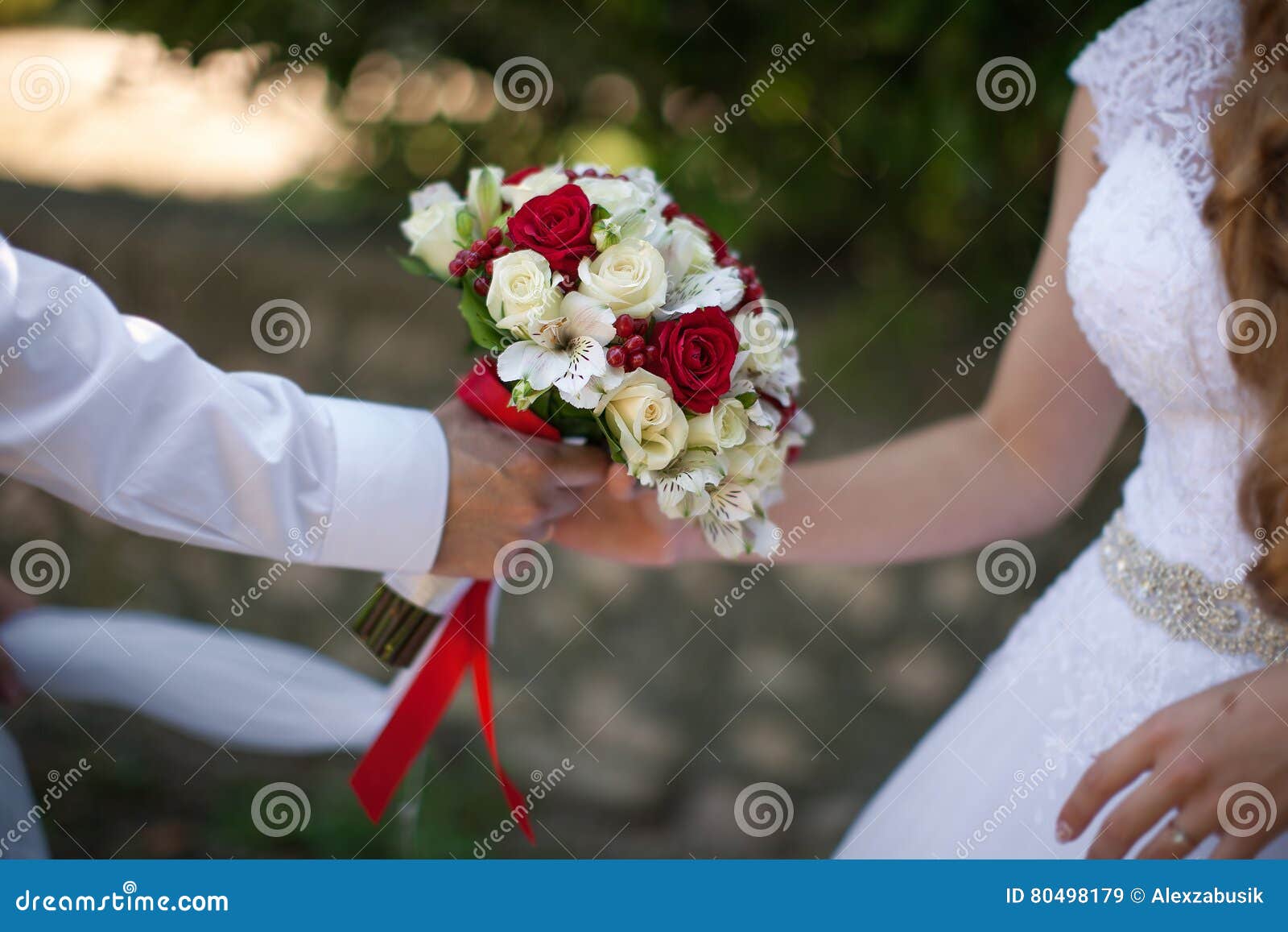 Groom gives bride bouquet stock image. Image of couple - 80498179