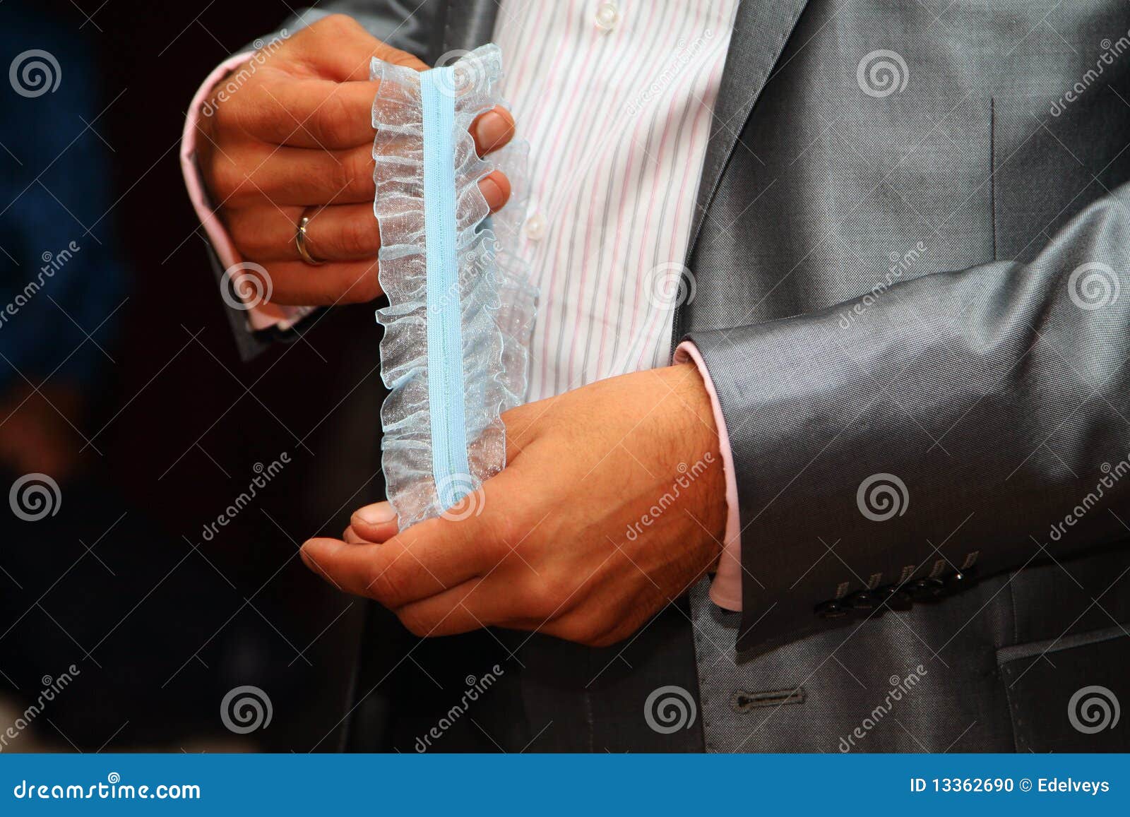 Groom Holding Bridal Garter Stock Photo Image of husband, groom 13362690
