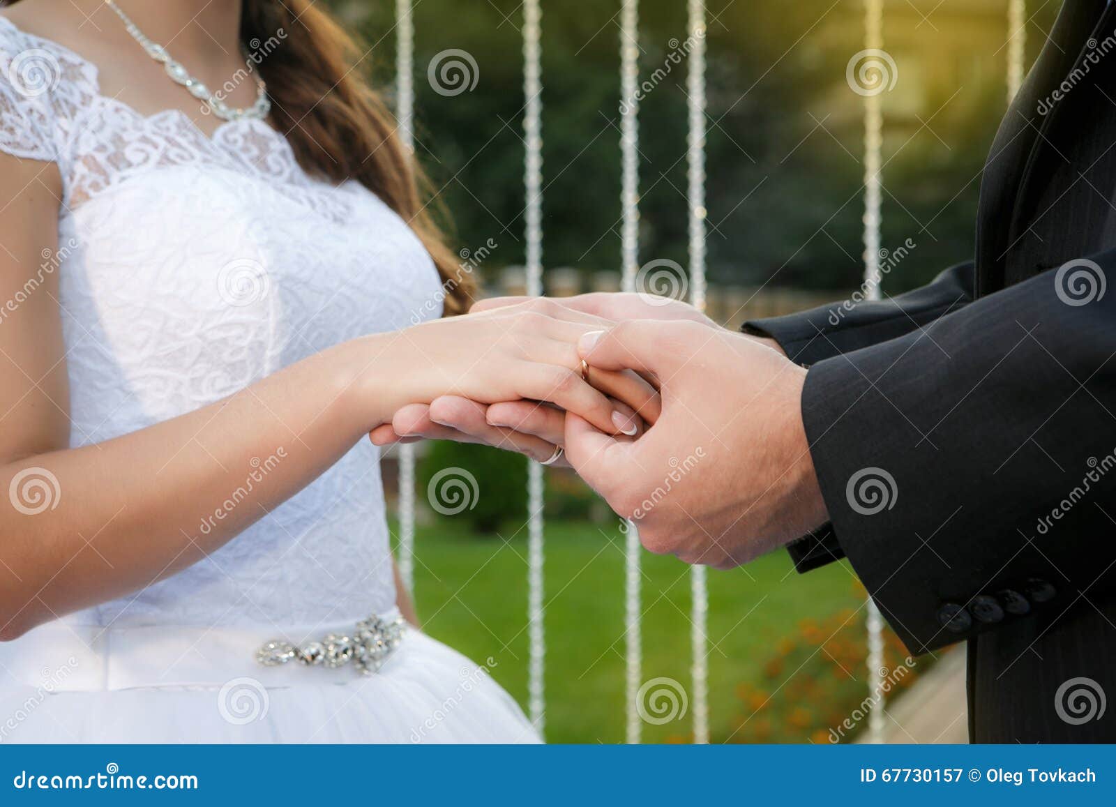 Groom Puts Wedding Ring Bride S Finger Ceremony 67730157 
